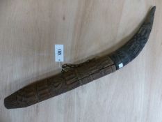 A 20th C. LAMU, SWAHILI HORN FLUTE BAND CARVED IN MAHOGANY AND TIPPED IN SIMILARLY CARVED HORN, A
