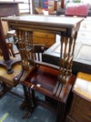 A SATIN WOOD CROSS BANDED MAHOGANY NEST OF FOUR TABLES TOGETHER WITH A NEST OF THREE WITH GREEN
