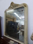 A VICTORIAN RECTANGULAR MIRROR WITHIN BEADING ON THE GREY PAINTED FRAME CRESTED BY TWO C-SHAPES
