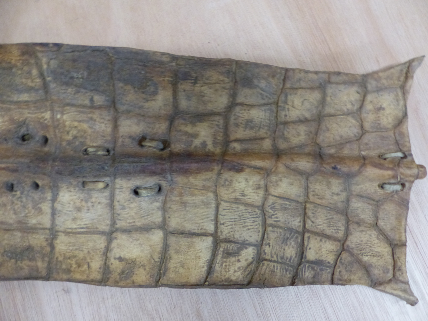A 20th C. TURKANA CROCODILE SKIN SHIELD OF RECTANGULAR SHAPE WITH POLE HANDLE TOGETHER WITH A - Image 4 of 10