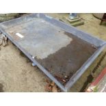 A LARGE LEAD PIG TRAY