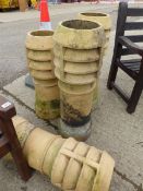 TWO PAIRS OF CHIMNEY POTS.