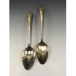 A PAIR OF GEORGE III SILVER OLD ENGLISH PATTERN SERVING SPOONS BY PETER, ANN AND WILLIAM BATEMAN,