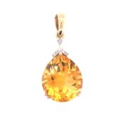 A HALLMARKED 9ct GOLD PEAR CUT CITRINE AND DIAMOND PENDANT. CITRINE MEASUREMENTS APPROX 12 X 14mm.