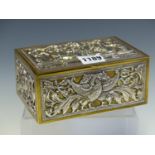 AN INDIAN METAL MOUNTED CALAMANDER WOOD BOX, THE BRASS BASE DAMASCENED IN SILVER AND COPPER WITH