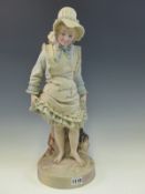 A LATE 19th C. TINTED PARIAN FIGURE OF A GIRL WITH HER SHOES OFF ABOUT TO PADDLE. H 45cms.