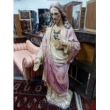 A LARGE ANTIQUE PLASTER FIGURE OF CHRIST AND THE SACRED HEART.