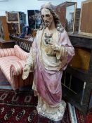 A LARGE ANTIQUE PLASTER FIGURE OF CHRIST AND THE SACRED HEART.