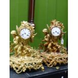 A PAIR OF 19th C. ORMOLU CASED CLOCKS BY MIROY FRERES, THE MOVEMENT STRIKING ON A BELL, THE CIRCULAR