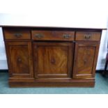 A 19th CENTURY CONTINENTAL MAHOGANY SIDE CABINET, THREE DRAWERS OVER THREE PANEL CUPBOARD DOORS H 87
