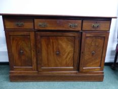 A 19th CENTURY CONTINENTAL MAHOGANY SIDE CABINET, THREE DRAWERS OVER THREE PANEL CUPBOARD DOORS H 87