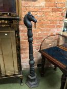 AN ANTIQUE STYLE CAST IRON HORSE TETHERING POST, THE FINIAL AS A HORSES HEAD WITH RING LOOP.