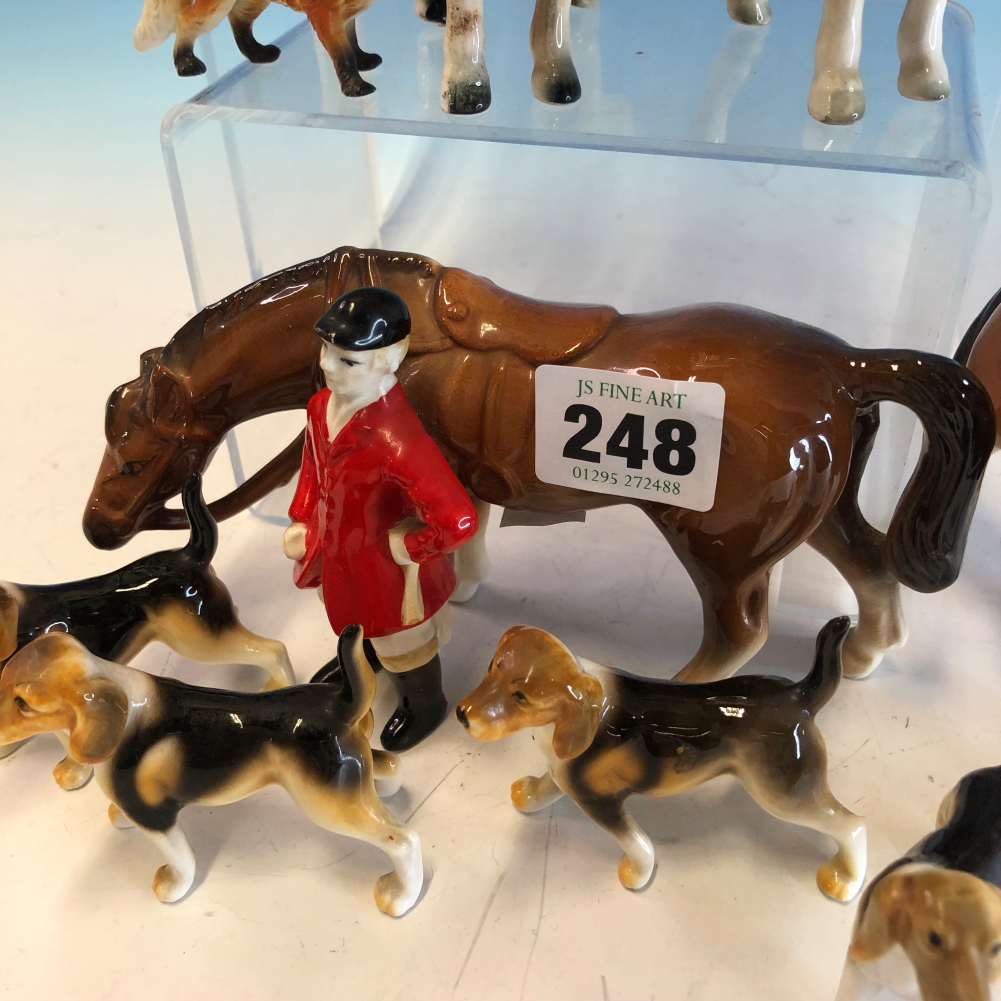 SEVEN BESWICK STYLE POTTERY HUNTSMEN WITH HORSES, SIX HOUNDS AND A FOX, SOME STAMPED FOREIGN - Image 7 of 16