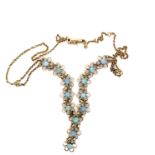 A 9ct HALLMARKED GOLD AND OPAL LAVALIERE STYLE NECKLACE. THE NECKLACE CONSISTING OF THIRTEEN