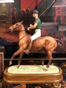A ROYAL WORCESTER DORIS LINDNER FIGURE OF H.R.H. THE DUKE OF EDINBURGH ON HIS POLO PONY, WITH