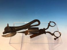 AN ANTIQUE BULLS HEAD CAN OPENER TOGETHER WITH A SET OF 19TH CENTURY STEEL CANDLE WICK TRIMMERS-