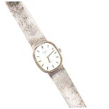 A VINTAGE ROTARY WRISTWATCH IN SILVER WITH SILVER MESH STRAP