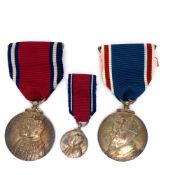A 1937 CORONATION MEDAL BOXED, TOGETHER WITH A 1910-1935 JUBILEE MEDAL