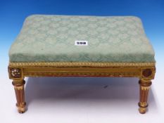 A 19TH CENTURY GILT WOOD AND UPHOLSTERED SMALL FOOT STOOL.