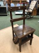 A 19th C. OAK SET OF LIBRARY STEPS, THE FOUR TREADS FOLDING UP AS A CHAIR.