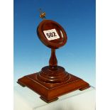 A SMALL MAHOHANY DESK TOP POCKET WATCH STAND.