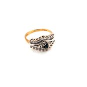 A 9ct HALLMARKED GOLD SAPPHIRE AND CZ CLAW SET DRESS RING. FINGER SIZE N. WEIGHT 3.28grms.