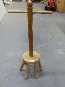 AN ANTIQUE ASH AND ELM WASHING DOLLY
