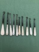 TEN ANTIQUE BUTTON HOOKS WITH BONE AND IVORY HANDLES