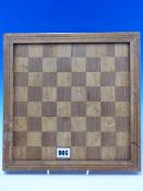 A VINATGE MAHOGANY, SATIN WOOD AND INLAID CHESS BOARD WITH REVERSE INLAID FOR NINE MENS MORRIS 32
