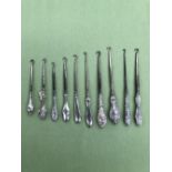 TEN ANTIQUE BUTTON HOOKS WITH SILVER HANDLES