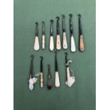 TWELVE ANTIQUE BUTTON HOOKS WITH MOTHER OF PERAL, HARDSTONE BONE AND IVORY HANDLES VARIOUS.