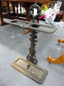 A SMALL CAST IRON STICK STAND
