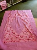 AN ANTIQUE QUILTED FABRIC BLANKET TOGETHER WITH A BOOK " DRESSING THE BED"- QUILTS AND COVERLETS