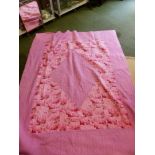 AN ANTIQUE QUILTED FABRIC BLANKET TOGETHER WITH A BOOK " DRESSING THE BED"- QUILTS AND COVERLETS