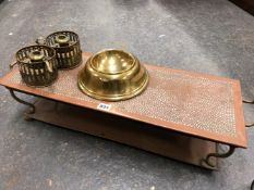 A TWO HANDLED COPPER FOOD WARMING PLATE, TWO BRASS CHAMBER STICKS, A BRASS DOG BOWL AND A CASED PAIR