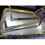 THREE ANTIQUE SILVER MOUNTED RIDING CROPS INCLUDING SWAINE.