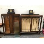 A 20th C. MAHOGANY AND A TALLER OAK BOW FRONT DISPLAY CABINET, THE LATTER. W 92 x D 32 x H