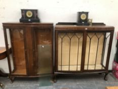 A 20th C. MAHOGANY AND A TALLER OAK BOW FRONT DISPLAY CABINET, THE LATTER. W 92 x D 32 x H