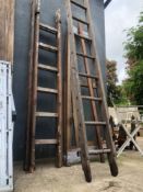 WOODEN LADDERS AND A LARGE ARTISTS EASEL