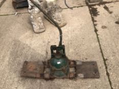 A VINTAGE CAST IRON PUMP