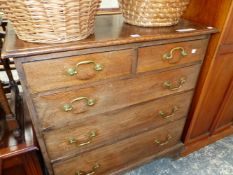 A GEORGE III OAK CHEST OF TWO SHORT AND THREE GRADED LONG DRAWERS ON BRACKET FEET. W 81 x D 48 x H