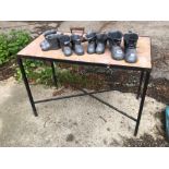 A MARBLE TOP TABLE ON STEEL FRAME