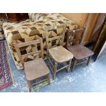 A SET OF FIVE CHILDRENS OAK SEATED KITCHEN CHAIRS AND ANOTHER WITH A TALLER BACK