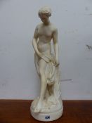 A WHITE PLASTER FIGURE OF A FEMALE BATHER