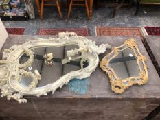 A WHITE PAINTED ROCOCO GIRANDOLE MIRROR TOGETHER WITH A SMALLER ROCOCO MIRROR