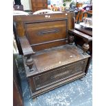 A 20th C.OAK MONKS BENCH WITH COFFER SEAT, THE TABLE TOP OPENING TO FORM THE BENCH BACK. W 87 x D 46