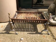 A FIRE GRATE WITH IRON AND BRASS DOGS.