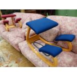 TWO STOKKE BENTWOOD ROCKING KNEELING CHAIRS UPHOLSTERED IN BLUE AND TERRACOTTA
