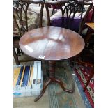 A 19th C. OAK TRIPOD TABLE, THE CIRCULAR TOP ON A TURNED COLUMN. Dia. 51 x H 70cms.