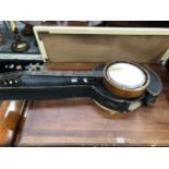 A LEATHERETTE CASED FIVE STRING ZITHER BANJO